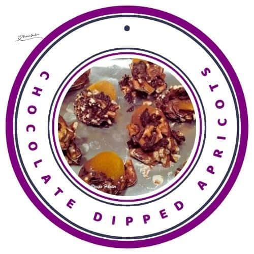 an image of Chocolate Dipped Apricots on tinfoil lined baking tray to set