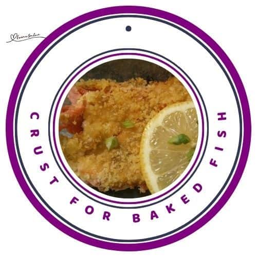 an image of fish with a crispy crust and a slice of lemon on the side