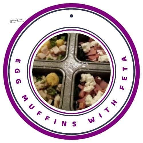 an image of a square muffin tin filled with ingredients for Egg Muffins with Feta