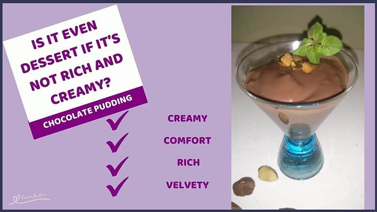 an image of a Chocolate Pudding in a blue glass stem bowl and decorated with mint