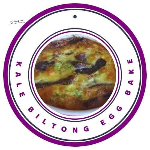 an image of a Kale Biltong Egg Bake in a red ramekin dish