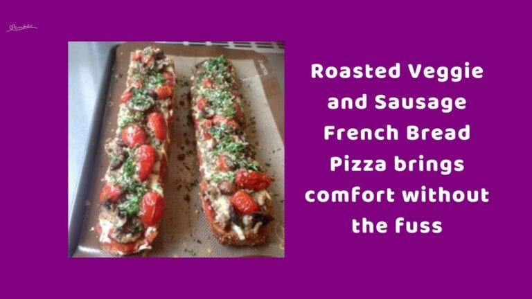 an image of French bread with pizza sauce, toppings, tomatoes and cheese