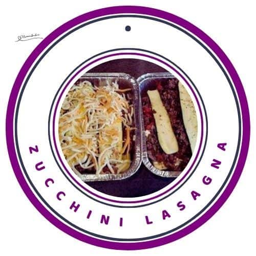 an image of tinfoil containers filled with Zucchini Lasagna