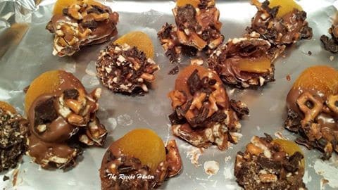 Plump Chocolate dipped Apricots with nuts as a special afternoon treat