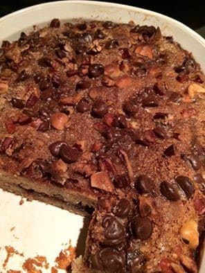 A dish filled with Cinnamon Chip Banana Coffee Cake