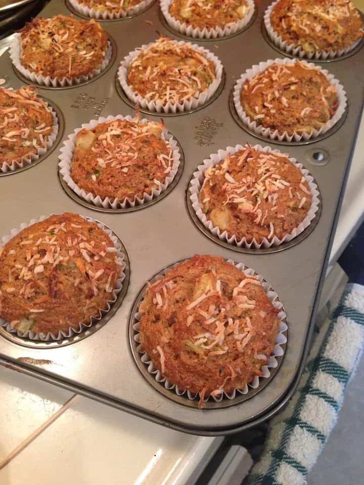 Morning Glory Muffins in paper cupcake liners in a baking tray