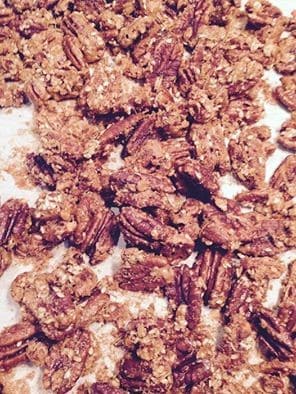 Pan baked snack of Sesame Rosemary Candied Pecans