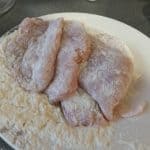 Chicken pieces dunked in flour