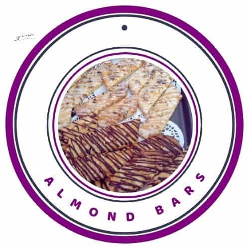 an image of Almond Bars topped with almonds or chocolate drizzle