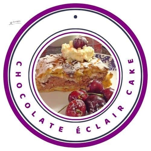 an image of a Chocolate Éclair Cake with mousse filling and topped with cherries and almonds