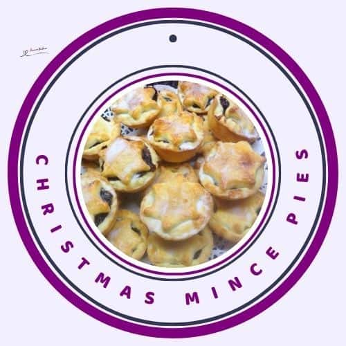 an image of Christmas Mince Pies with a star decoration and an icing sugar dusting