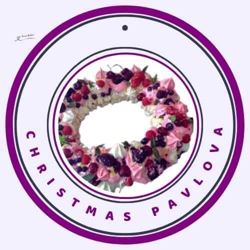 an image of a Christmas Pavlova with cream and topped with berries