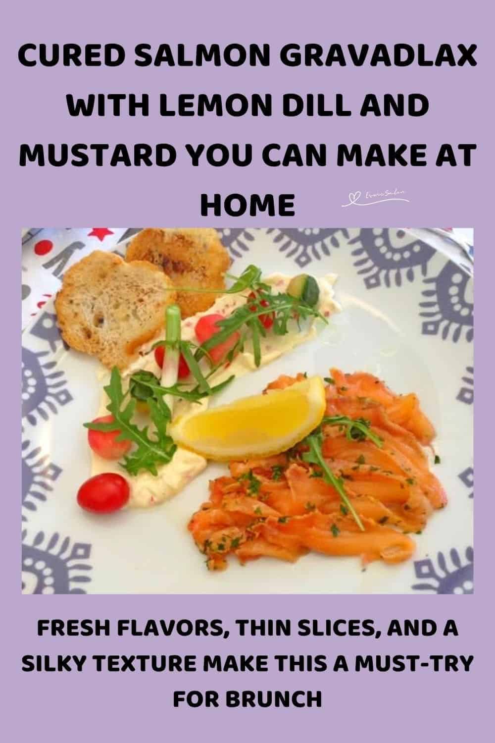 an image of Cured Salmon Gravadlax served with greens, tomato, lemon and croutons