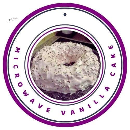 an image of a round cake with a hole in the middle covered in pink icing and sprinkles