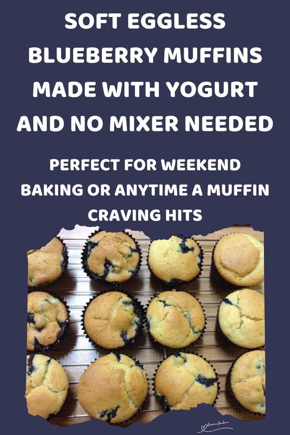 an image of Eggless Blueberry Muffins in paper cupcake holders on wire rack