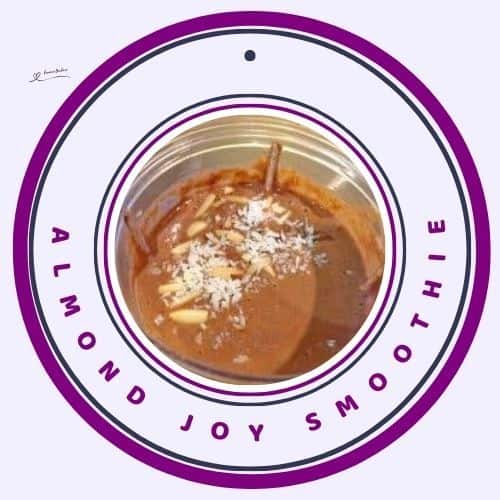 an image of an Almond Joy Smoothie with coconut and almond shavings