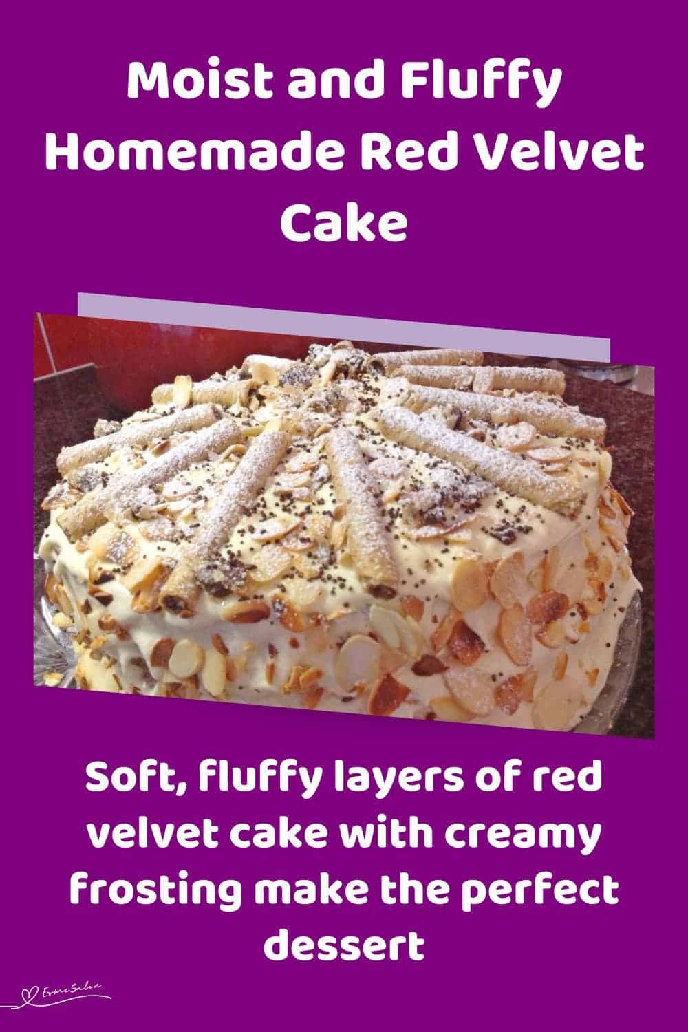 an image of a Red Velvet Cake with cream cheese frosting and decorated with slivered almonds and chocolate curls