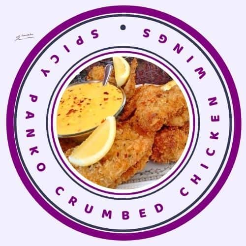 an image of Spicy Panko Crumbed Chicken Wings with cheese dip and lemon slices