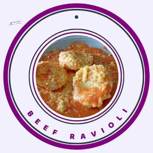 an image of Beef Ravioli in a tomato sauce served in a blue bowl