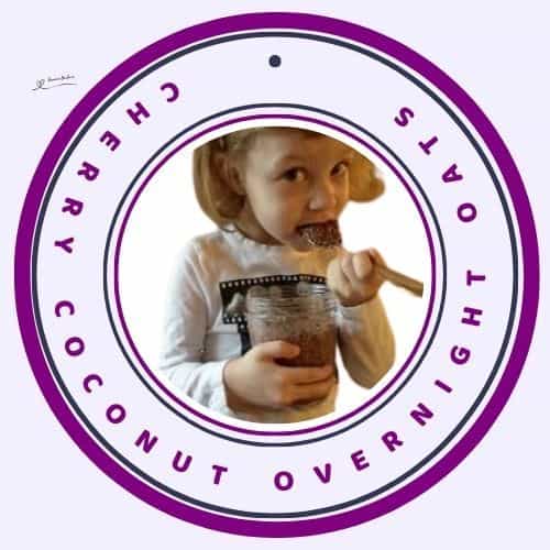 an image of a little girl enjoying Black Cherries Coconut Overnight Oats