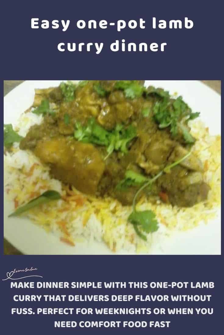 an image of a plate of Lamb Curry served on rice