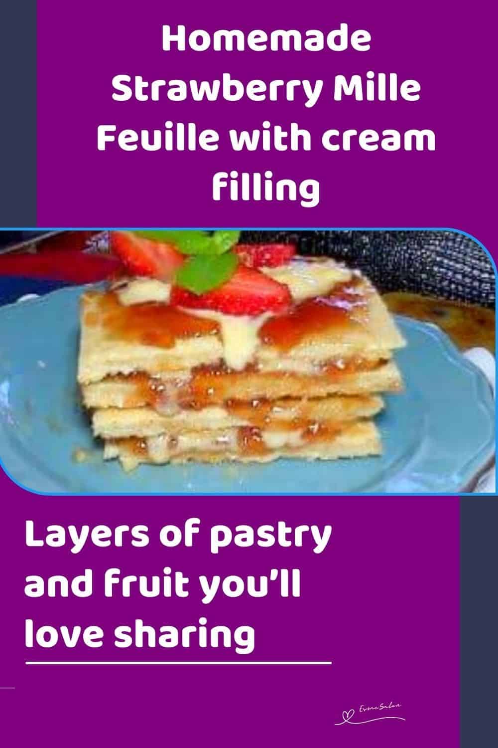 an image of a Strawberry Mille Feuille Cake on a blue plate and decorated with mint leave