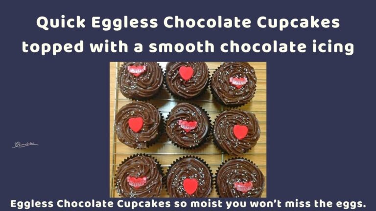an image of Eggless Chocolate Cupcakes with sprinkles and red decorations