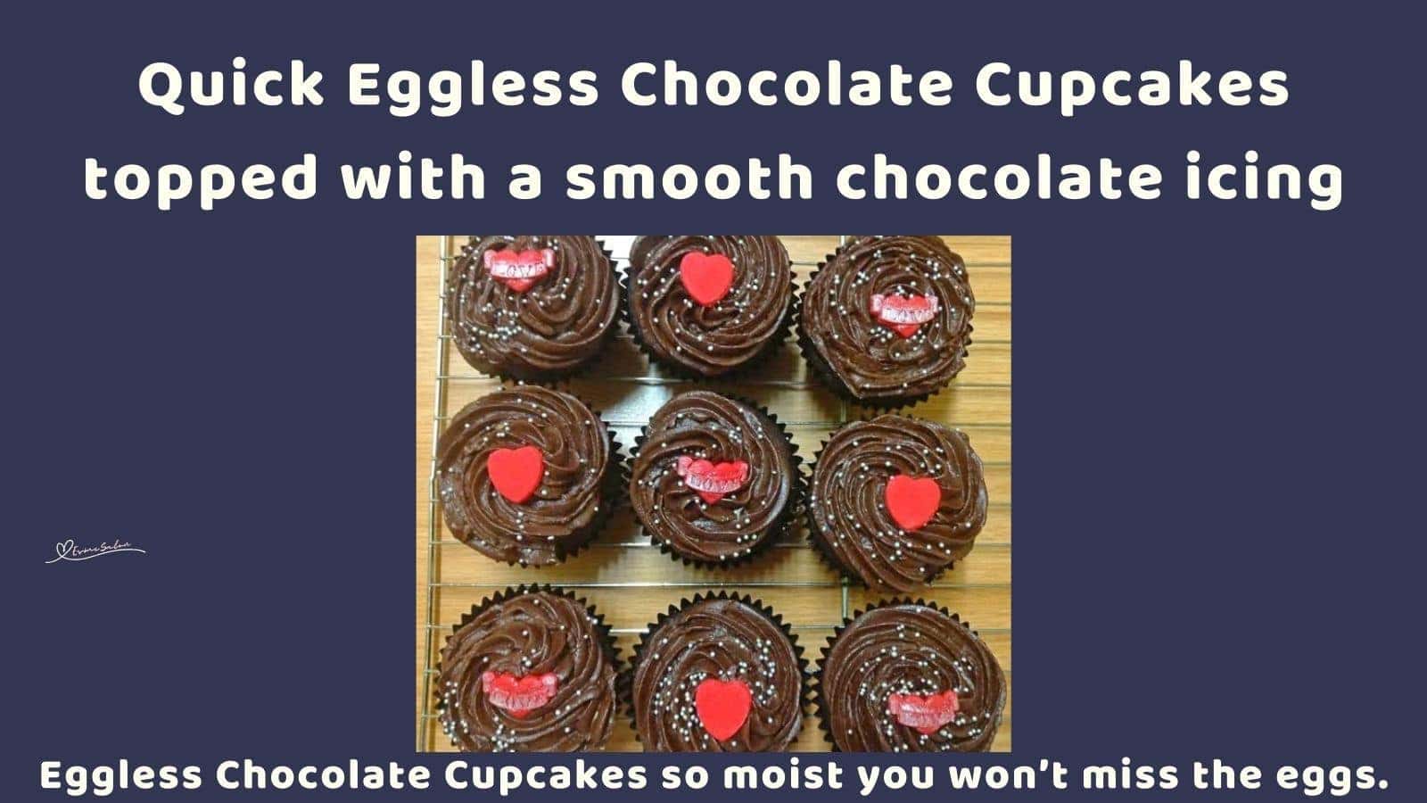 an image of Eggless Chocolate Cupcakes with sprinkles and red decorations