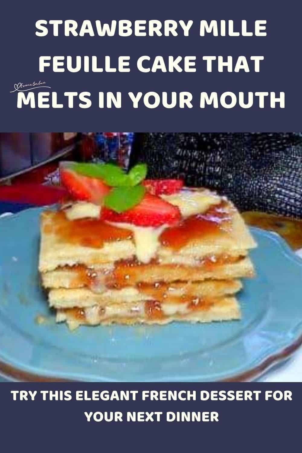 an image of a Strawberry Mille Feuille Cake on a blue plate and decorated with mint leave