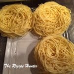 Angel hair pasta still in a roll, pre-cooked