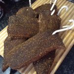 Dried meat strips, cured and similar to Jerky