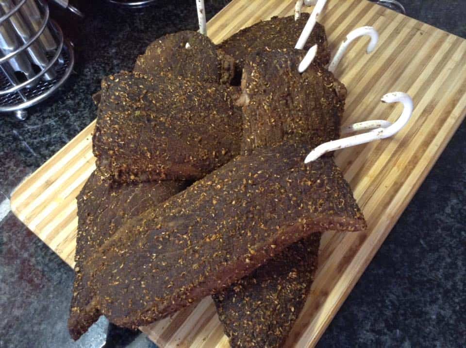 Dried meat strips, cured and similar to Jerky