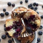 One Blueberry Cream Cheese muffins studded with lots of plump berries and fresh berries on the side
