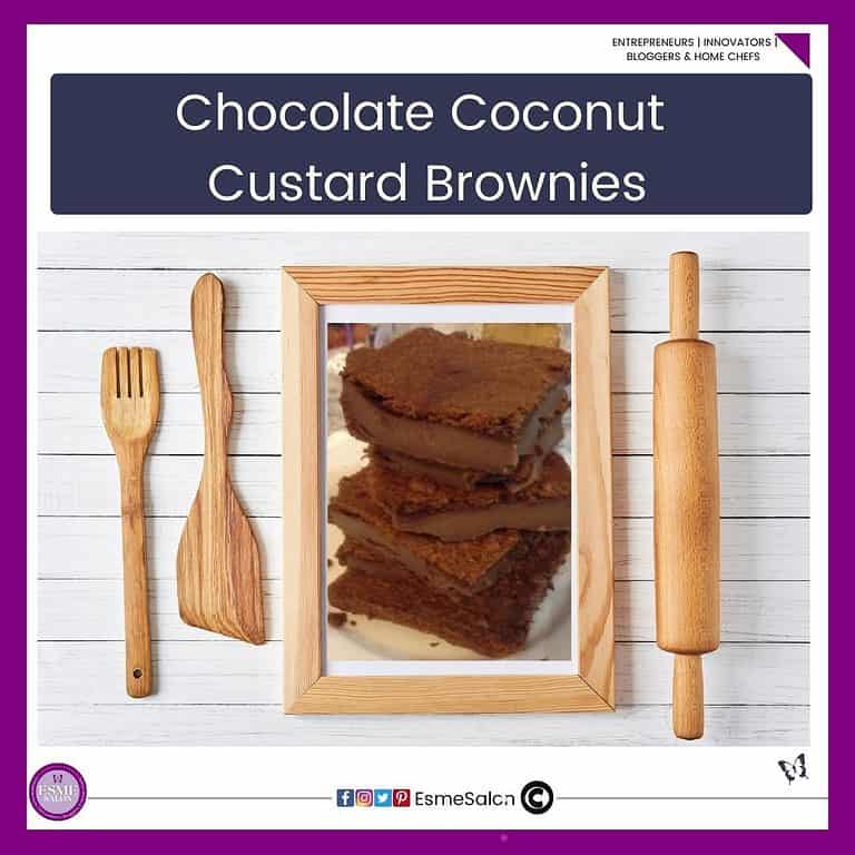 an image of a white serving plate pilled high with Chocolate Coconut Custard Brownies in a wooden frame with a wooden spoon, fork and a rolling pin on the sides