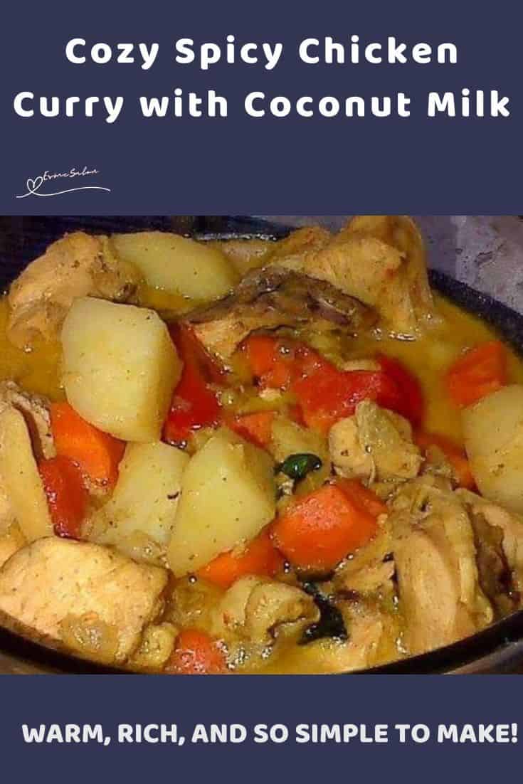 an image of a bowl filled with Spicy Chicken Curry, potatoes, carrots and peppers