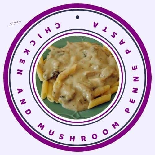 an image of Creamy Chicken and Mushroom Penne Pasta on a green plate