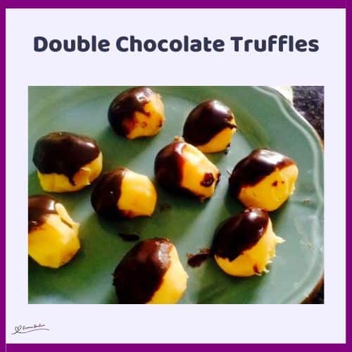 an image of Double Chocolate Truffles, white and brown on a green plate