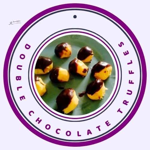 an image of Double Chocolate Truffles, white and brown on a green plate