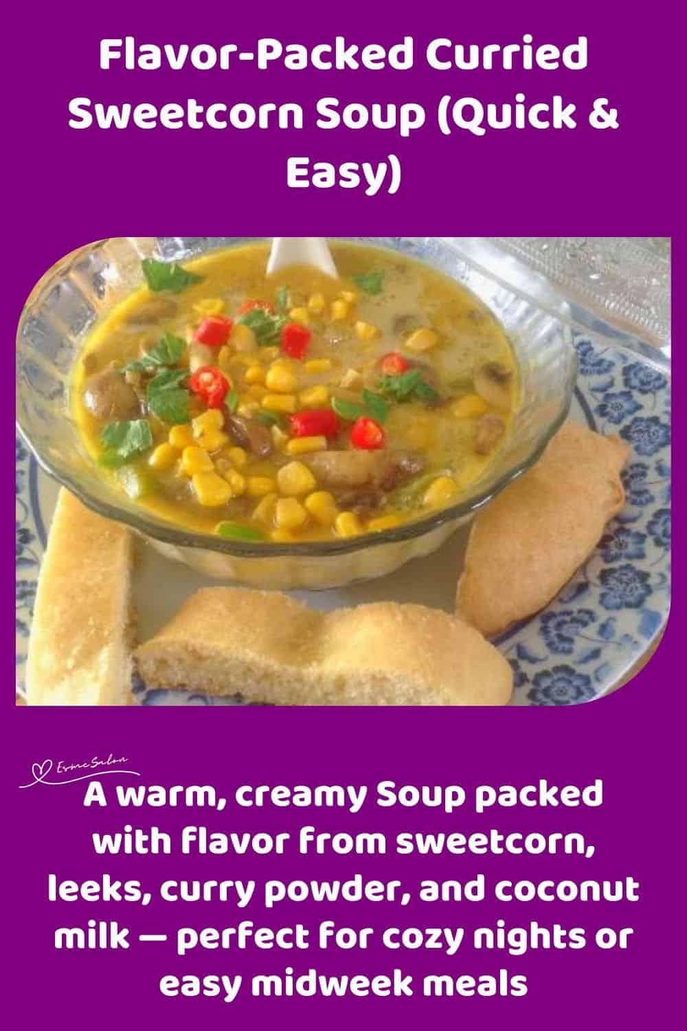 an image of a glass bowl with Curried Sweetcorn Soup and bread on the side