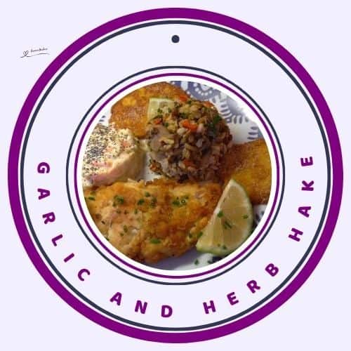 an image of Garlic and Herb Hake with Savoury Lentil Rice on a white and blue plate