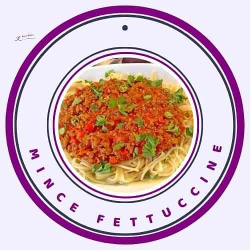 an image of a plate of Mince Fettuccine garnished with fresh parsley