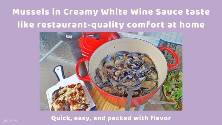 an image of a red cast iron pot with Mussels in Creamy White Wine Sauce