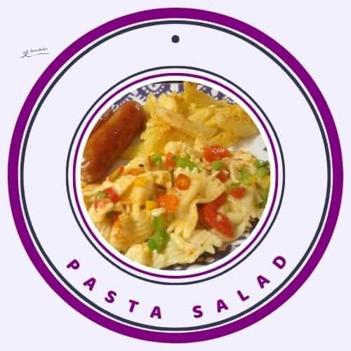 an image of a plate with Pasta Salad, grillers on the side