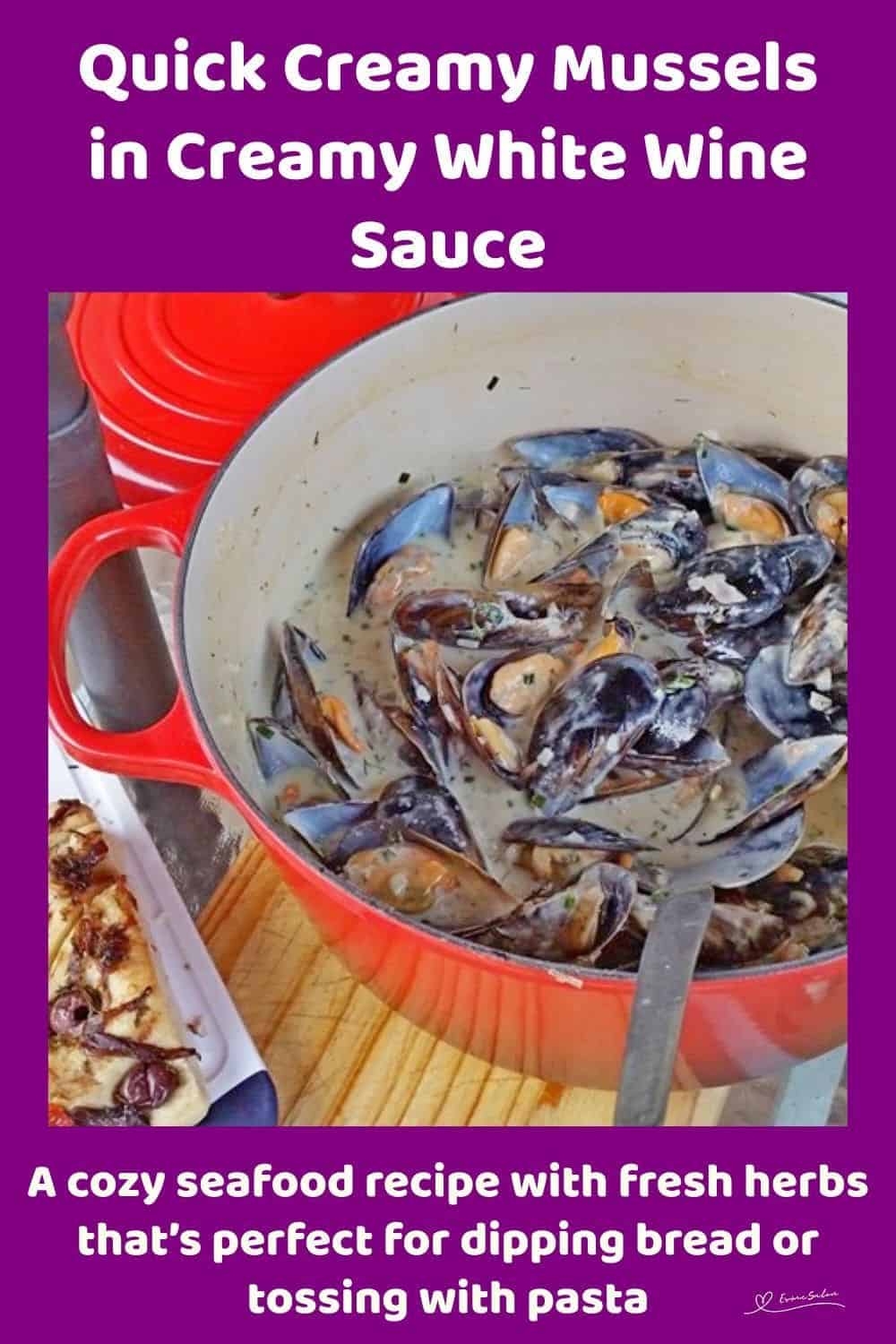 an image of a red cast iron pot with Mussels in Creamy White Wine Sauce