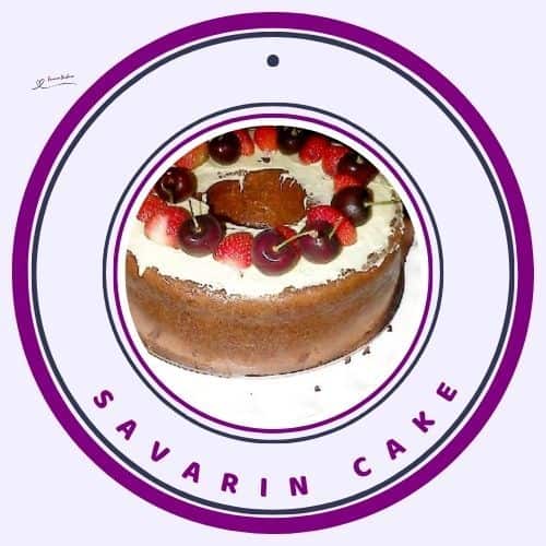 an image of a French-inspired Savarin Cake topped with white chocolate, cherries and strawberries