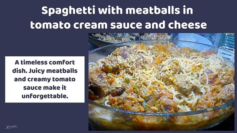 an image of a glass dish with Spaghetti with Meatballs topped with cheese