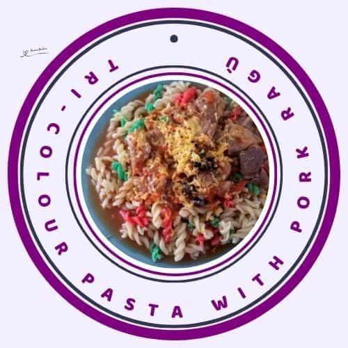 an image of a blue serving dish with Tri-colour Pasta with Pork Ragù