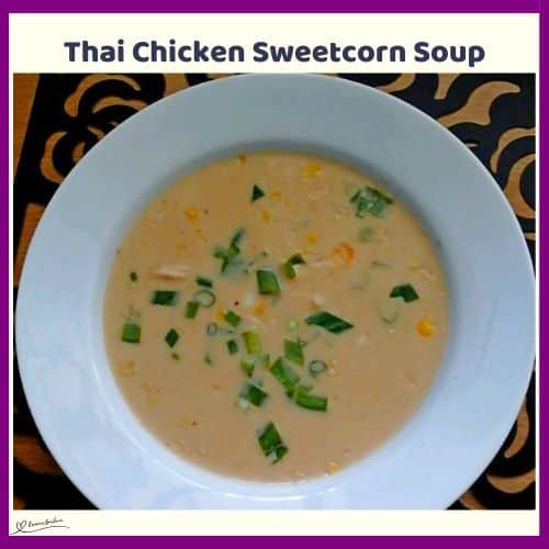 an image of Thai Chicken Sweetcorn Soup in a while soup bowl sprinkled with spring onions