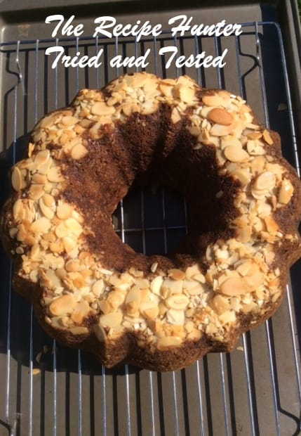 A banana bread baked in a ring pan and topped with Slivered Almonds