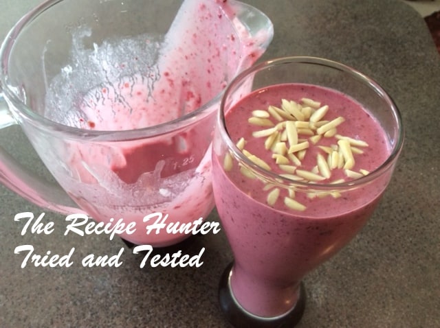 Breakfast Berry Smoothie with almond slivers